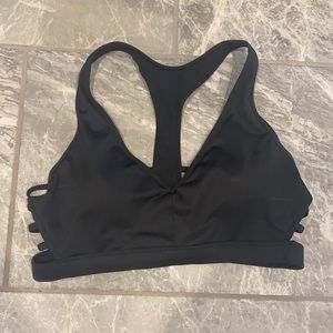Victoria Secrets black sports bra.